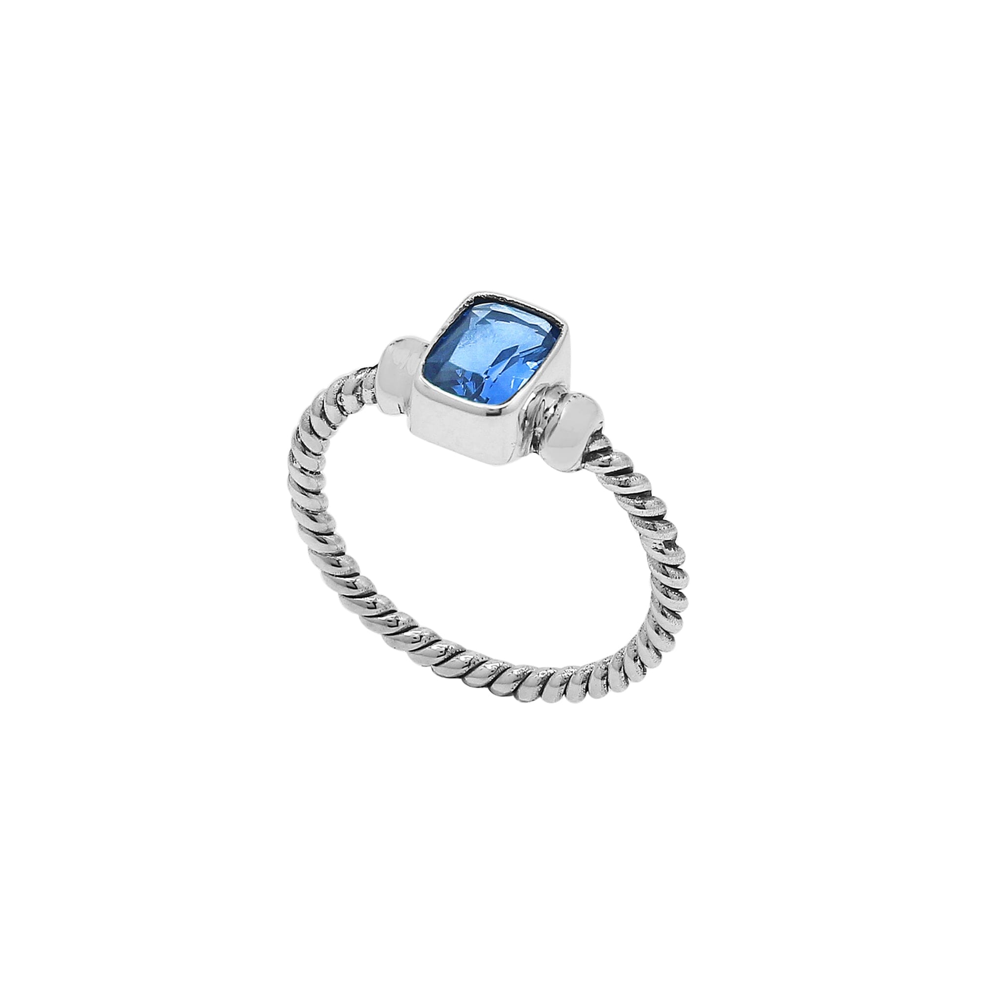 Handcrafted sterling silver twisted band ring with rectangular-cut Blue Topaz Quartz, artisan unisex jewelry for everyday wear or gifting.