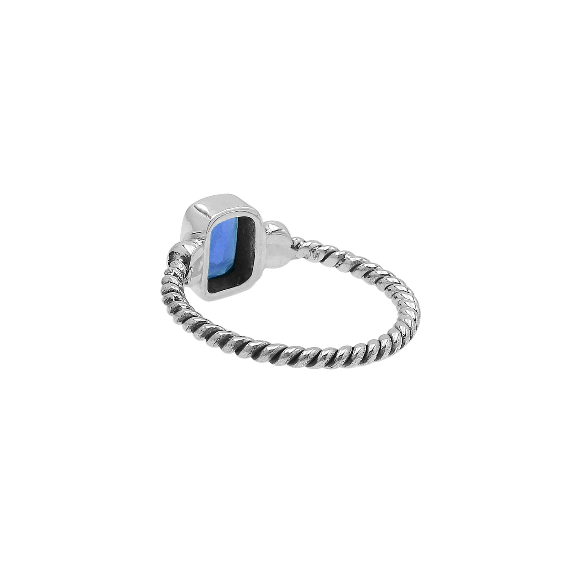Handcrafted sterling silver twisted band ring with rectangular-cut Blue Topaz Quartz, artisan unisex jewelry for everyday wear or gifting.