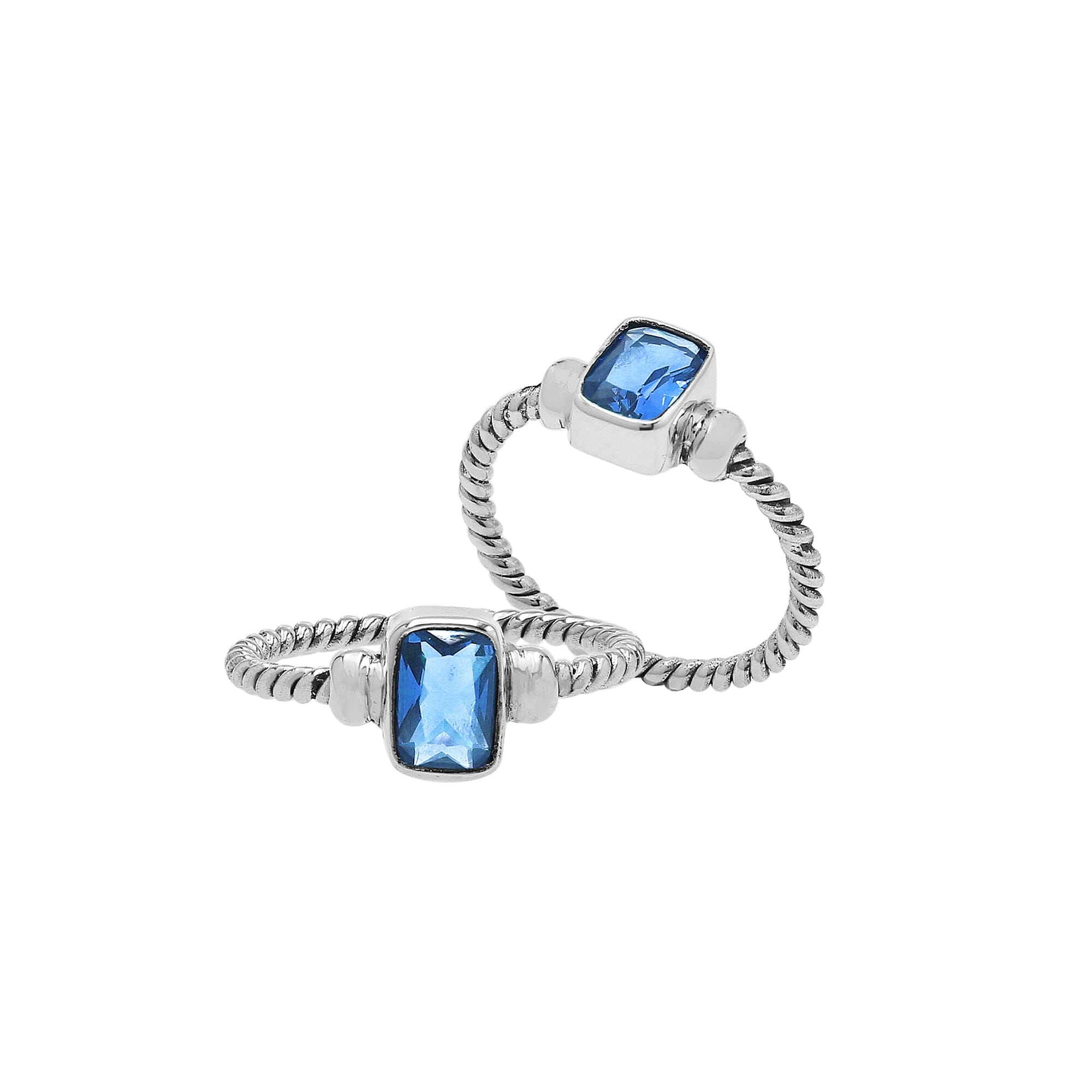 Handcrafted sterling silver twisted band ring with rectangular-cut Blue Topaz Quartz, artisan unisex jewelry for everyday wear or gifting.
