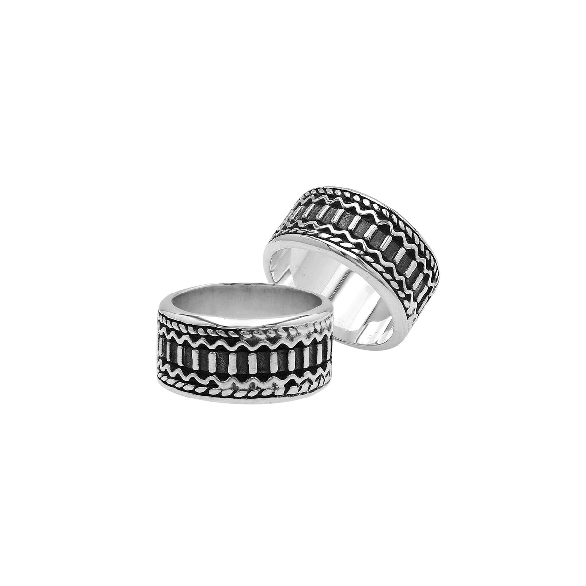 Handcrafted sterling silver wide band ring with oxidized Bali-inspired carvings, unisex artisan jewelry for everyday wear or gifting.