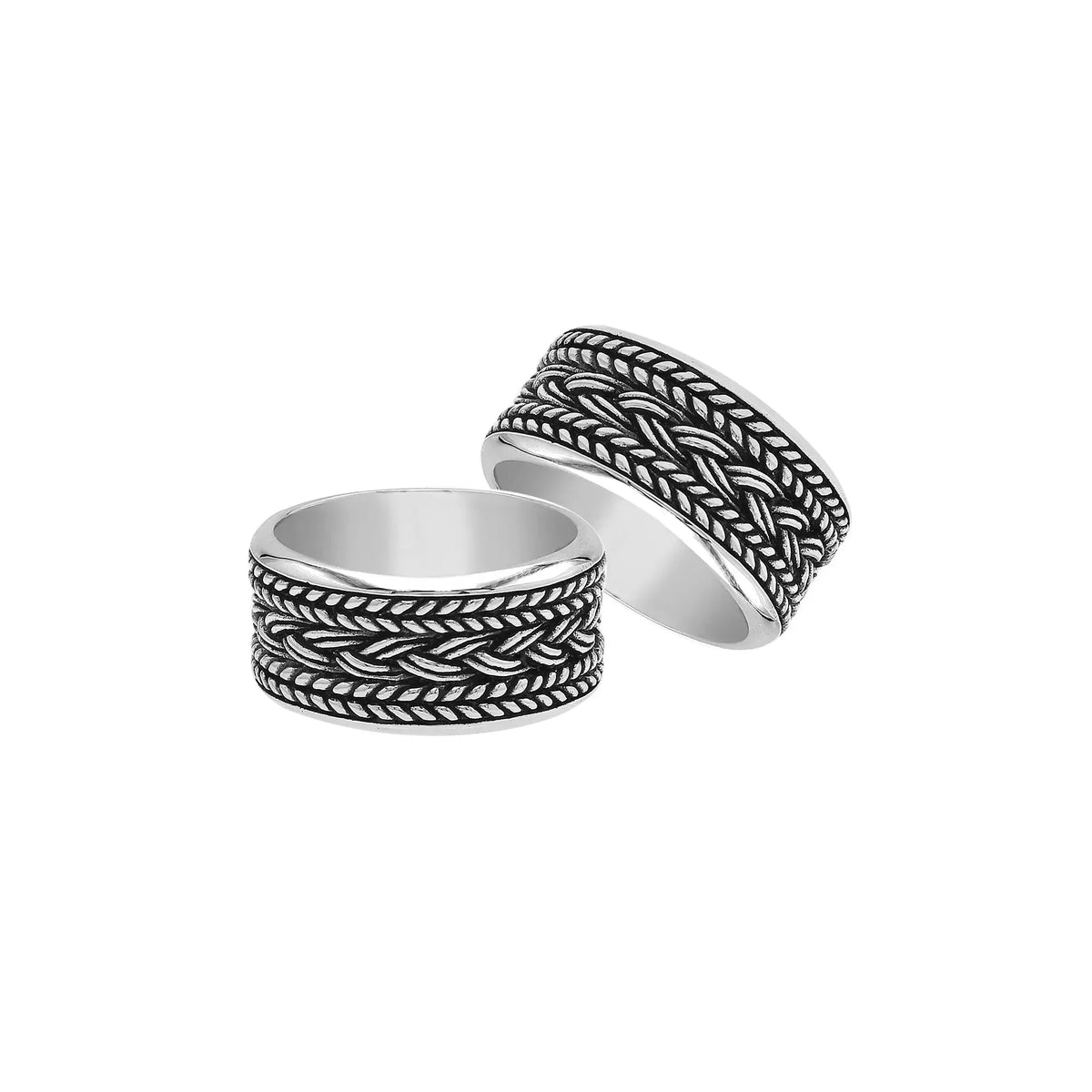 Handcrafted sterling silver wide band ring with intricate braided Bali-inspired design and oxidized finish, unisex artisan jewelry for everyday wear or gifting.