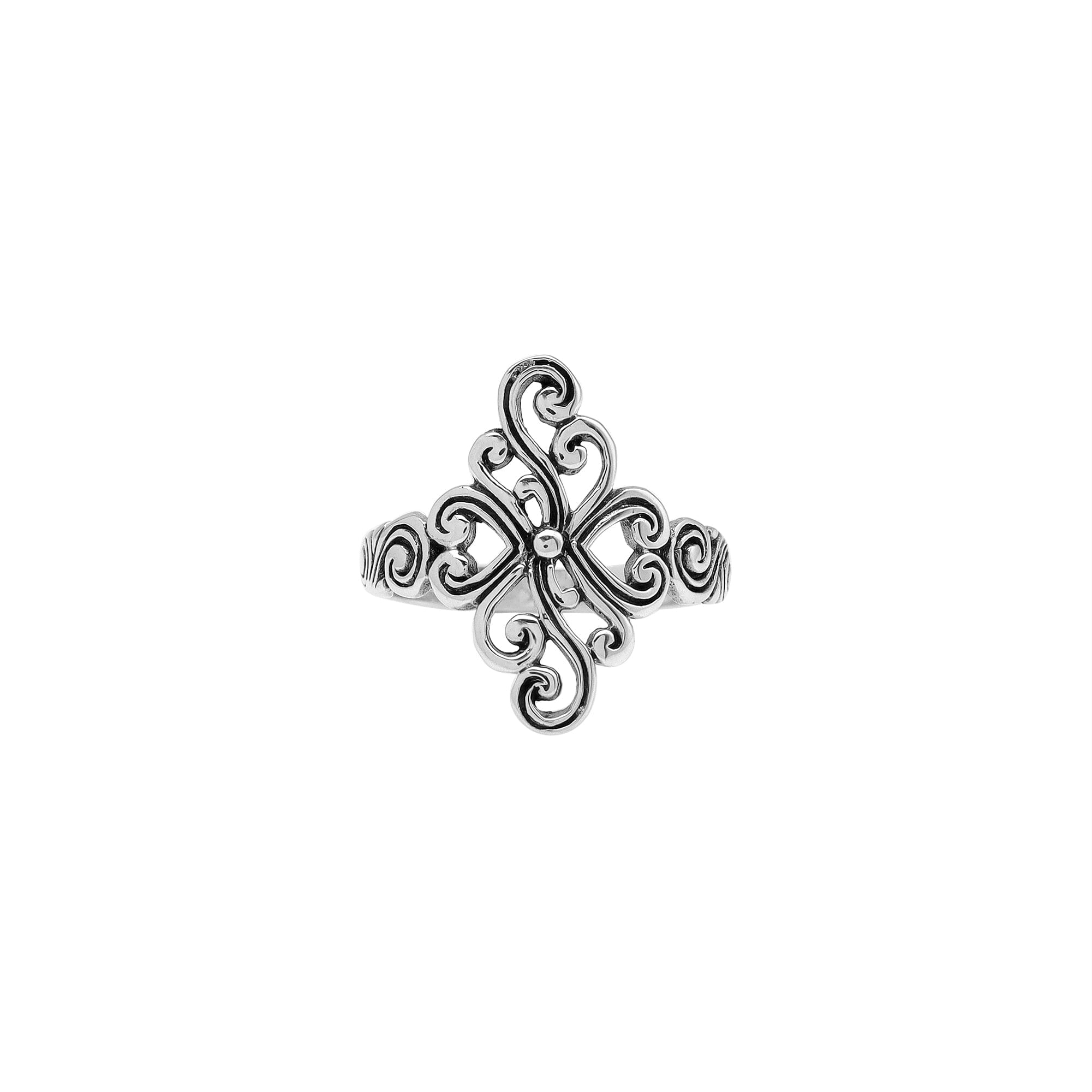 Sterling silver adjustable ring with elegant floral swirl design, handcrafted Balinese artisan jewelry for everyday wear.