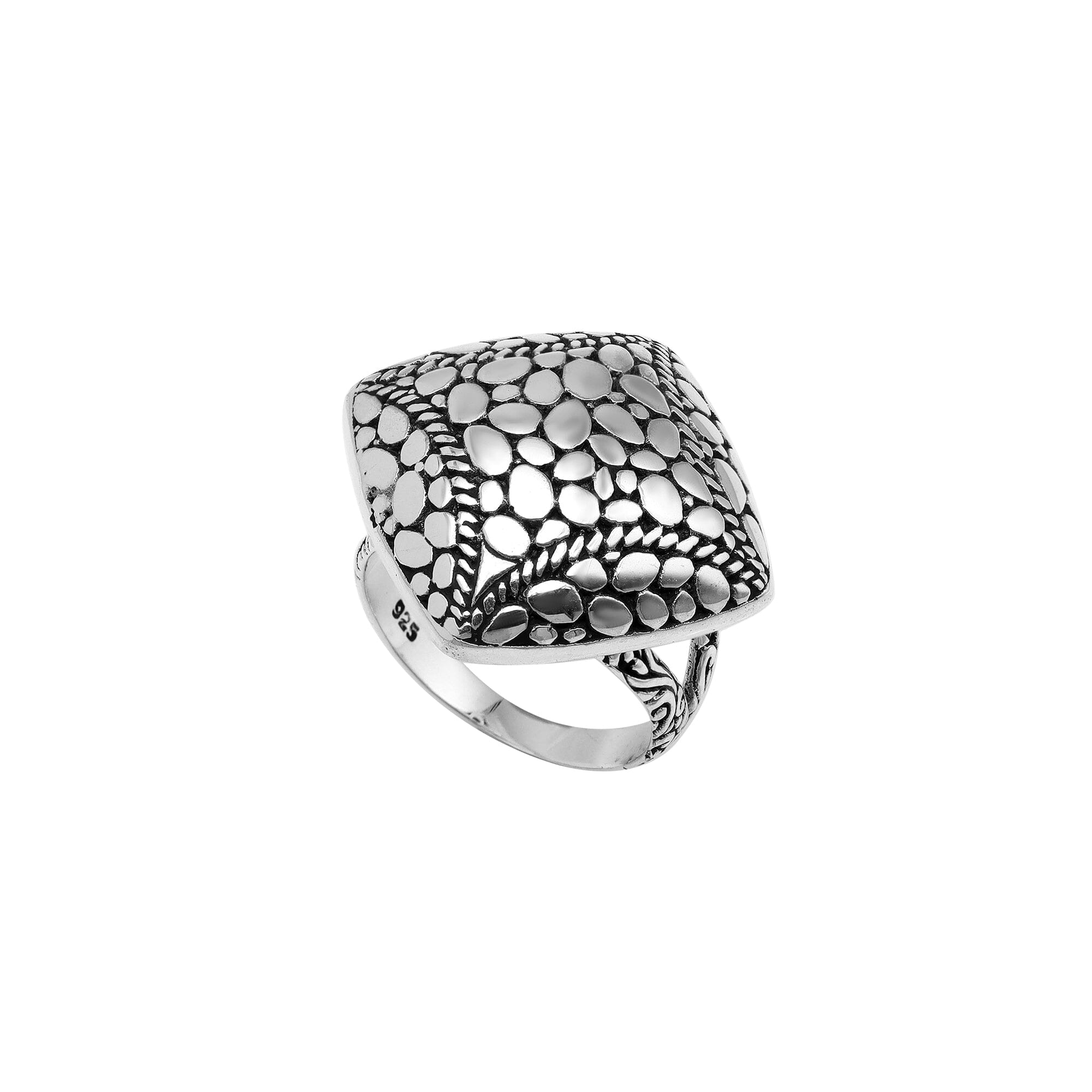 Sterling silver cushion dome ring with intricate Balinese dot design, handcrafted artisan statement jewelry.