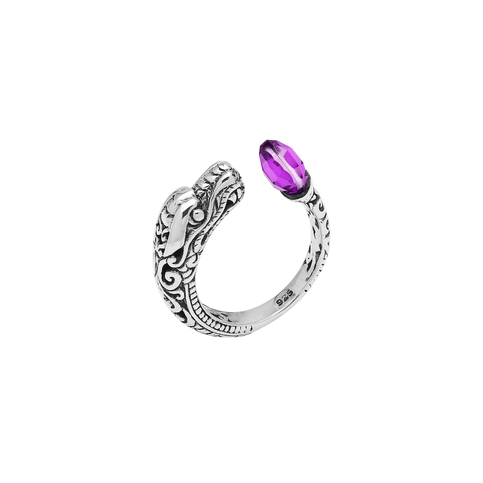 Handcrafted sterling silver dragon head ring with faceted Amethyst Quartz and detailed Balinese carvings – bold spiritual boho jewelry for women.