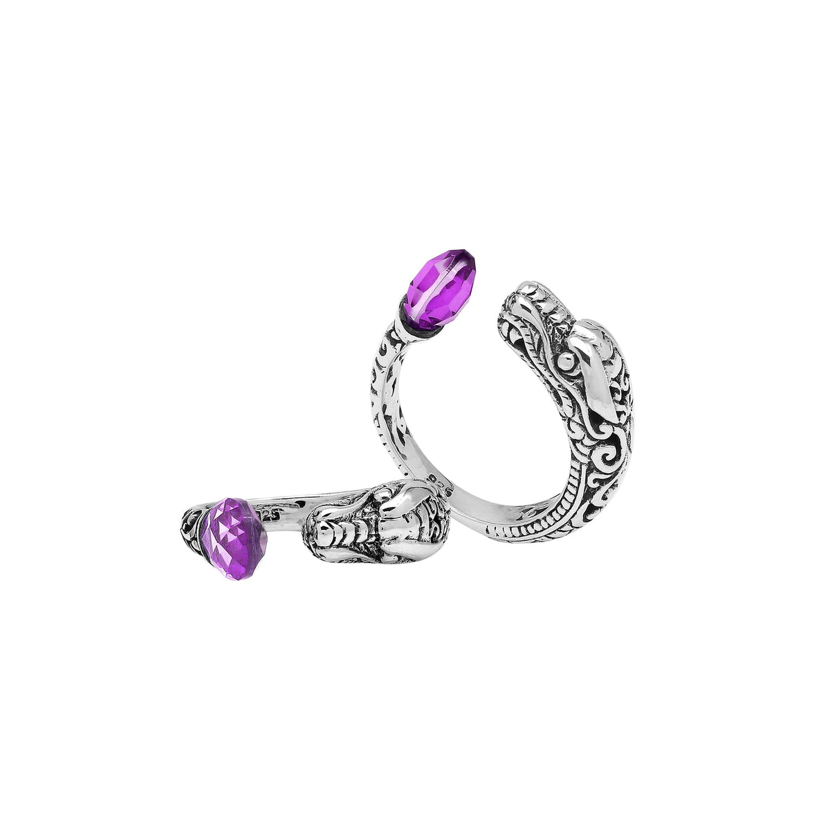Handcrafted sterling silver dragon head ring with faceted Amethyst Quartz and detailed Balinese carvings – bold spiritual boho jewelry for women.
