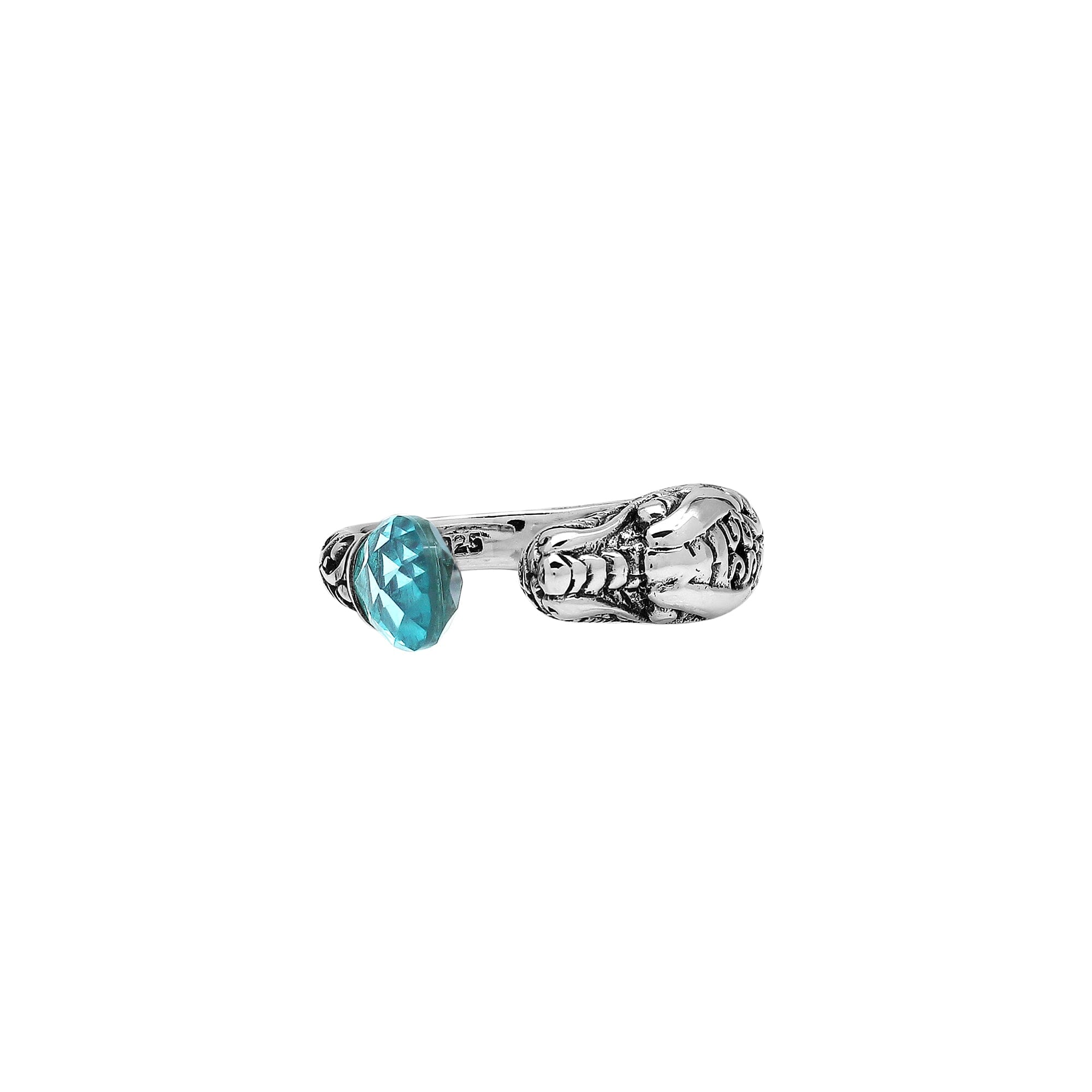 Handcrafted sterling silver dragon bypass ring with sparkling Blue Topaz Quartz, unique Bali artisan jewelry gift.