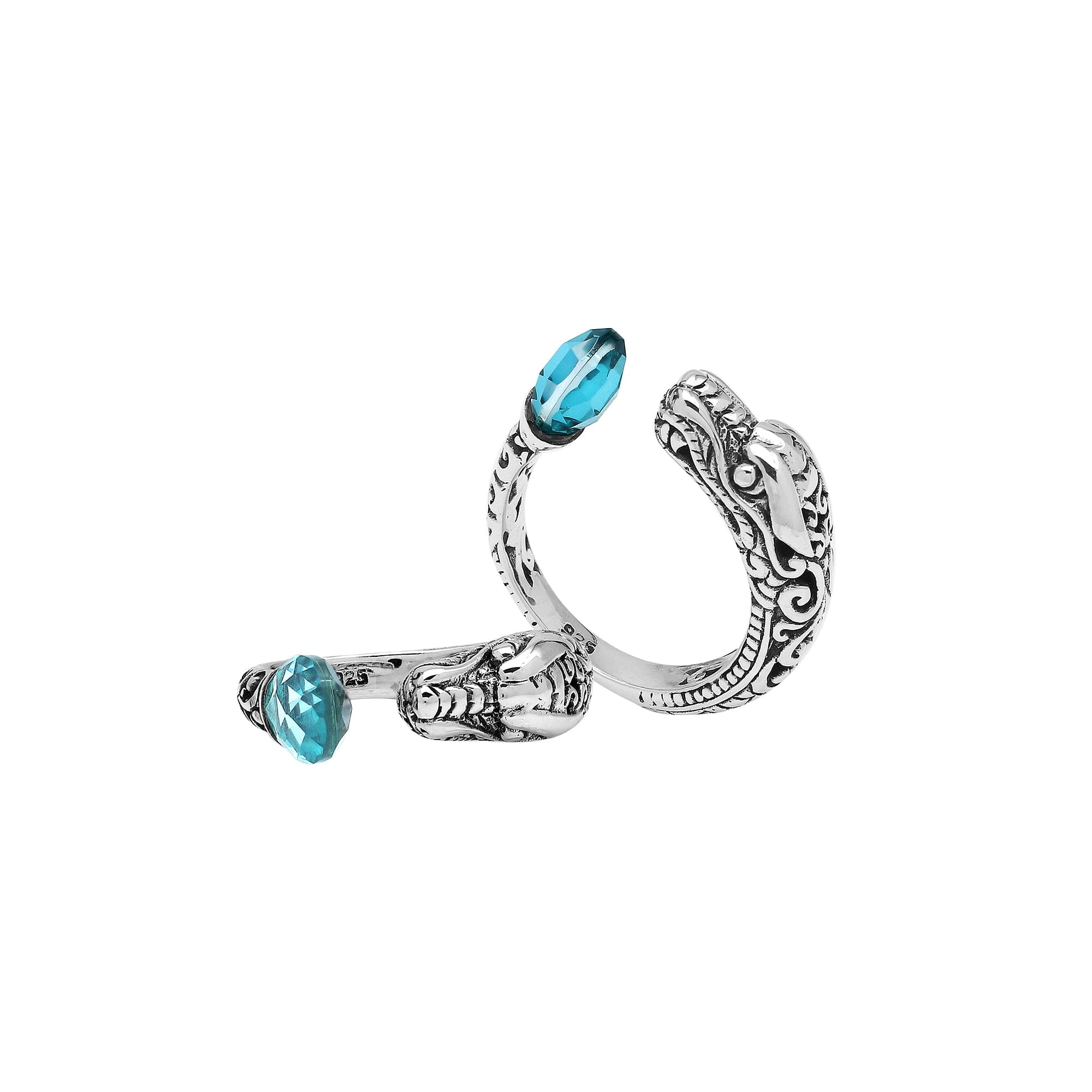 Handcrafted sterling silver dragon bypass ring with sparkling Blue Topaz Quartz, unique Bali artisan jewelry gift.