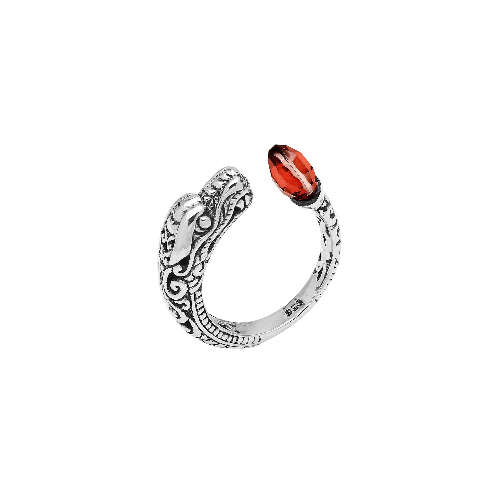 Handcrafted sterling silver dragon ring with two faceted Garnet Quartz, detailed Balinese carvings, and a bold bypass design.