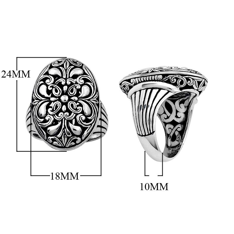 Handcrafted sterling silver oval floral ring with Balinese scroll detailing and oxidized finish, elegant artisan statement jewelry.