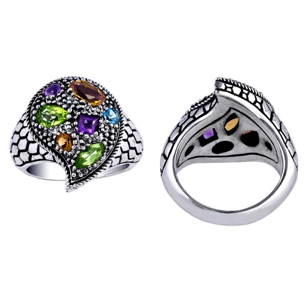 Handcrafted sterling silver swirl ring with colorful quartz—Amethyst Quartz, Peridot Quartz, Citrine Quartz, Blue Topaz Quartz, and Garnet Quartz— artisan-made in Bali.