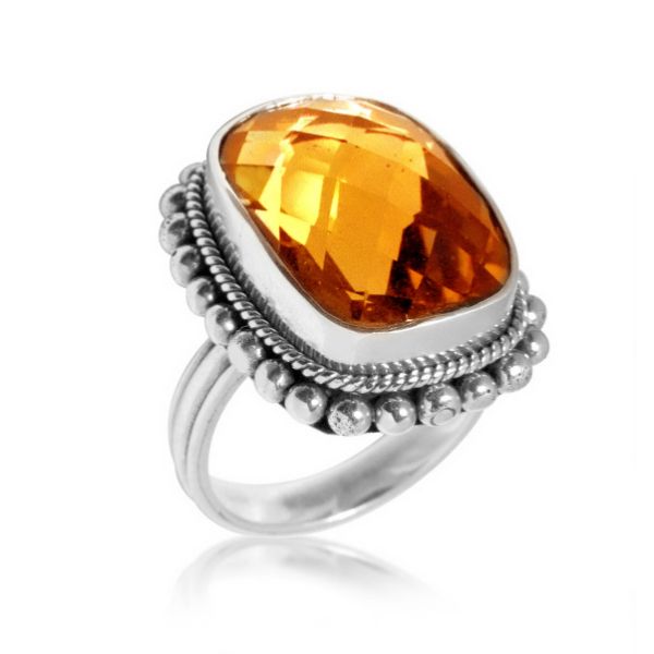 Sterling silver statement ring with cushion-cut golden citrine Quartz and Balinese beaded detailing, handcrafted for women’s jewelry collections.Inc 