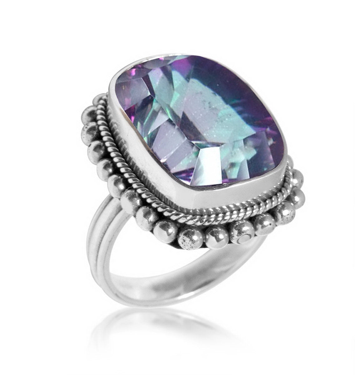 Sterling silver ring with faceted Mystic Topaz in purple, green, and blue hues – handcrafted Balinese statement jewelry.