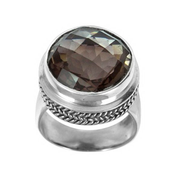 Sterling silver ring with a faceted smoky quartz and braided bezel detail, handcrafted in Bali for a bold artisan look.
