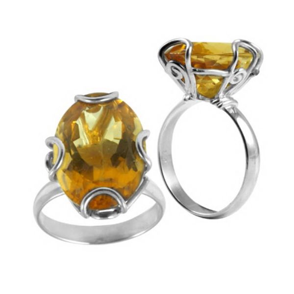 Sterling silver ring with faceted oval Citrine Quartz in scroll prong setting – handcrafted Balinese cocktail jewelry.