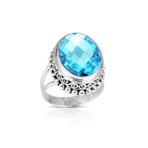 Sterling silver ring with faceted oval Blue Topaz Quartz, Balinese scroll and bead details – handcrafted artisan cocktail jewelry.