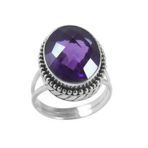 Sterling silver ring with faceted oval Amethyst Quartz and Balinese beaded details – handcrafted artisan cocktail jewelry.