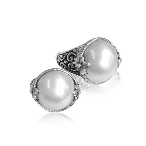 Sterling silver ring with radiant round Pearl and Balinese Floral scroll details – handcrafted artisan cocktail jewelry.