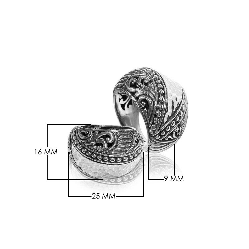 Handcrafted Balinese silver dome ring with hammered texture and scroll accents – unisex statement jewelry.