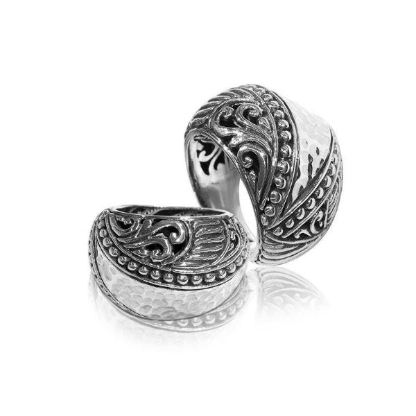 Handcrafted Balinese silver dome ring with hammered texture and scroll accents – unisex statement jewelry.