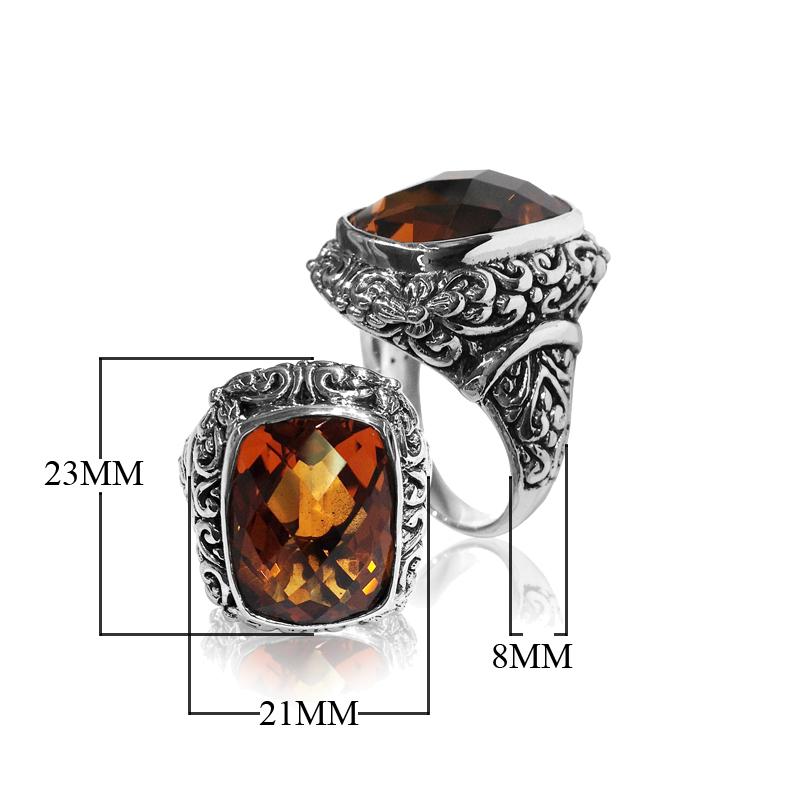 Handcrafted Balinese silver ring with cushion-cut Citrine Quartz and ornate scroll design – bold statement jewelry.
