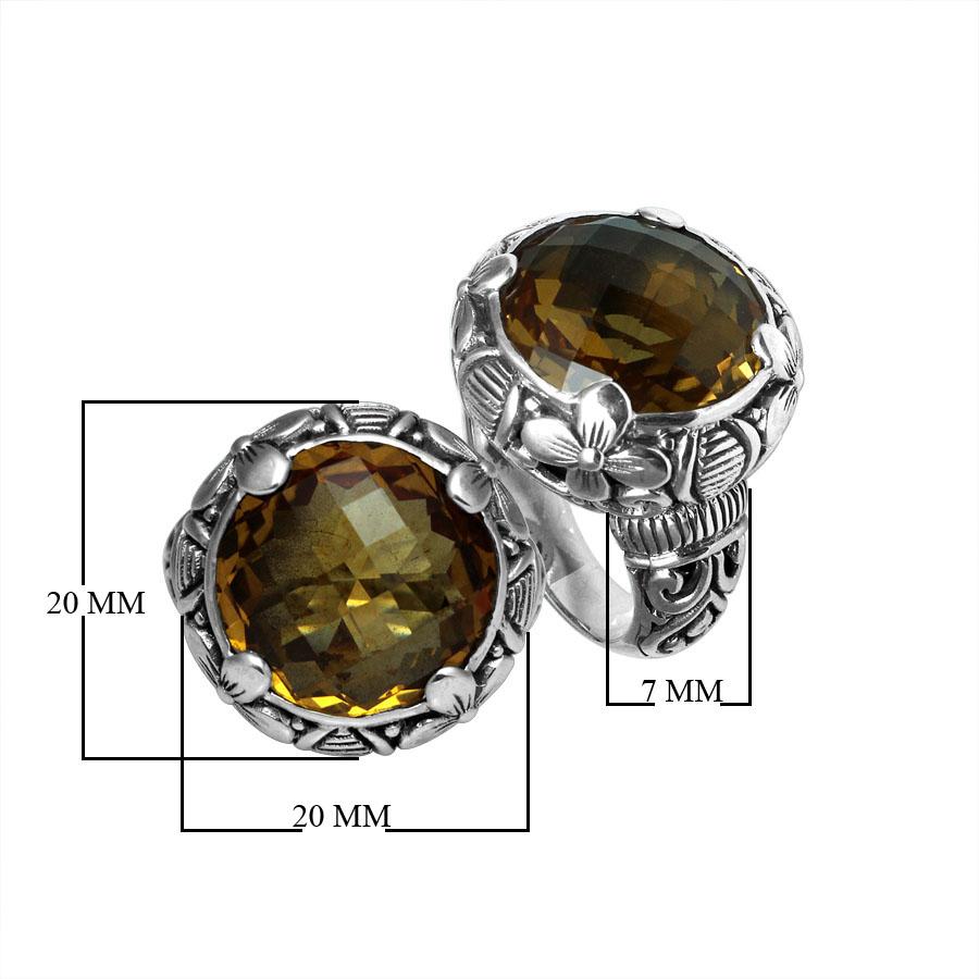 Handcrafted Bali silver ring with round Citrine Quartz and detailed floral carvings.
