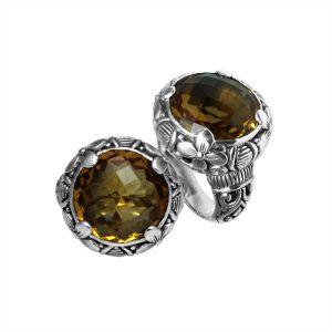 Handcrafted Bali silver ring with round Citrine Quartz and detailed floral carvings.