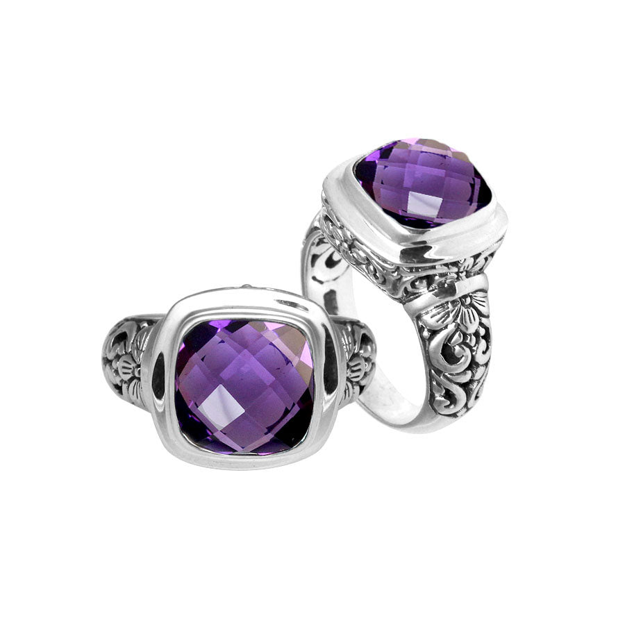 Handcrafted Bali silver ring with cushion-cut Amethyst Quartz and floral carvings.