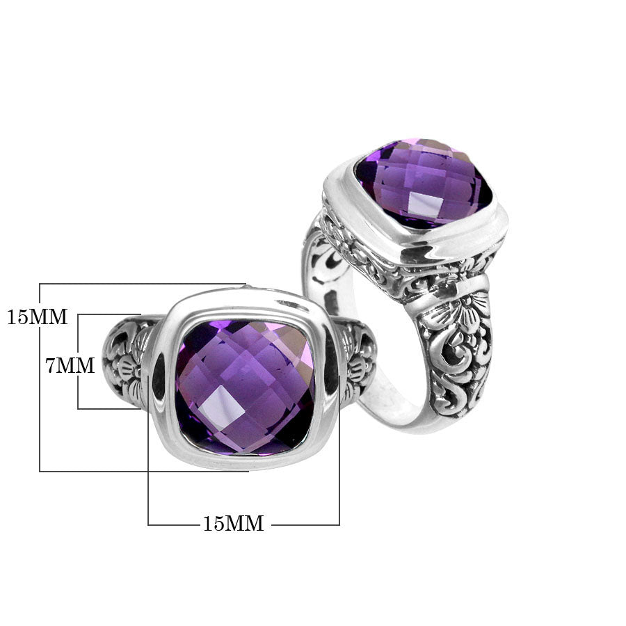 Handcrafted Bali silver ring with cushion-cut Amethyst Quartz and floral carvings.