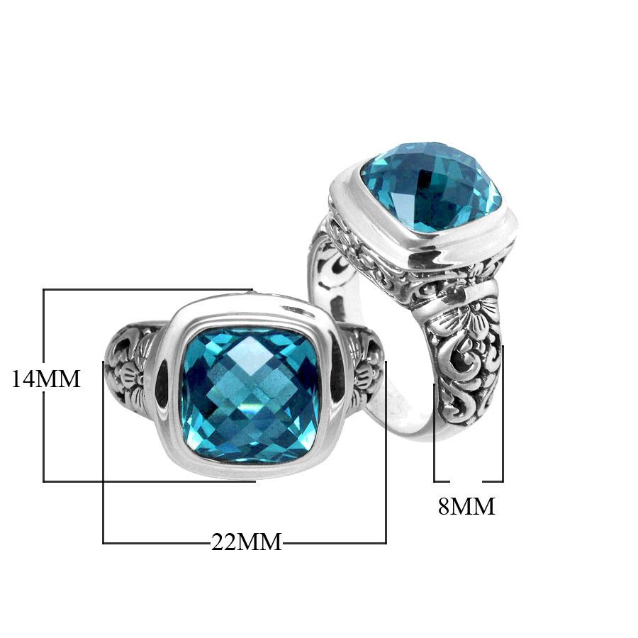 Handcrafted Bali silver ring with cushion-cut Blue Topaz Quartz and artisan carvings.