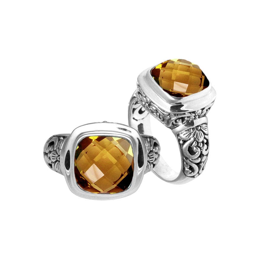 Handcrafted Bali silver ring with cushion-cut Citrine Quartz and artisan carvings.