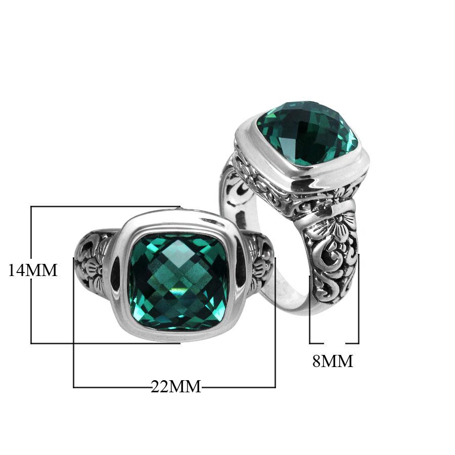 Handcrafted Bali silver ring with cushion-cut Green Quartz and artisan carvings.