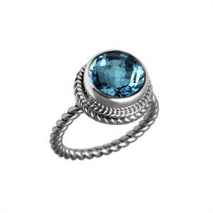 Handcrafted Bali silver ring with round Blue Topaz Quartz and rope-style band.