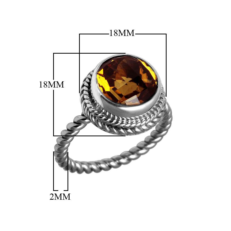 Handcrafted Bali silver ring with round Citrine Quartz and rope-style band.