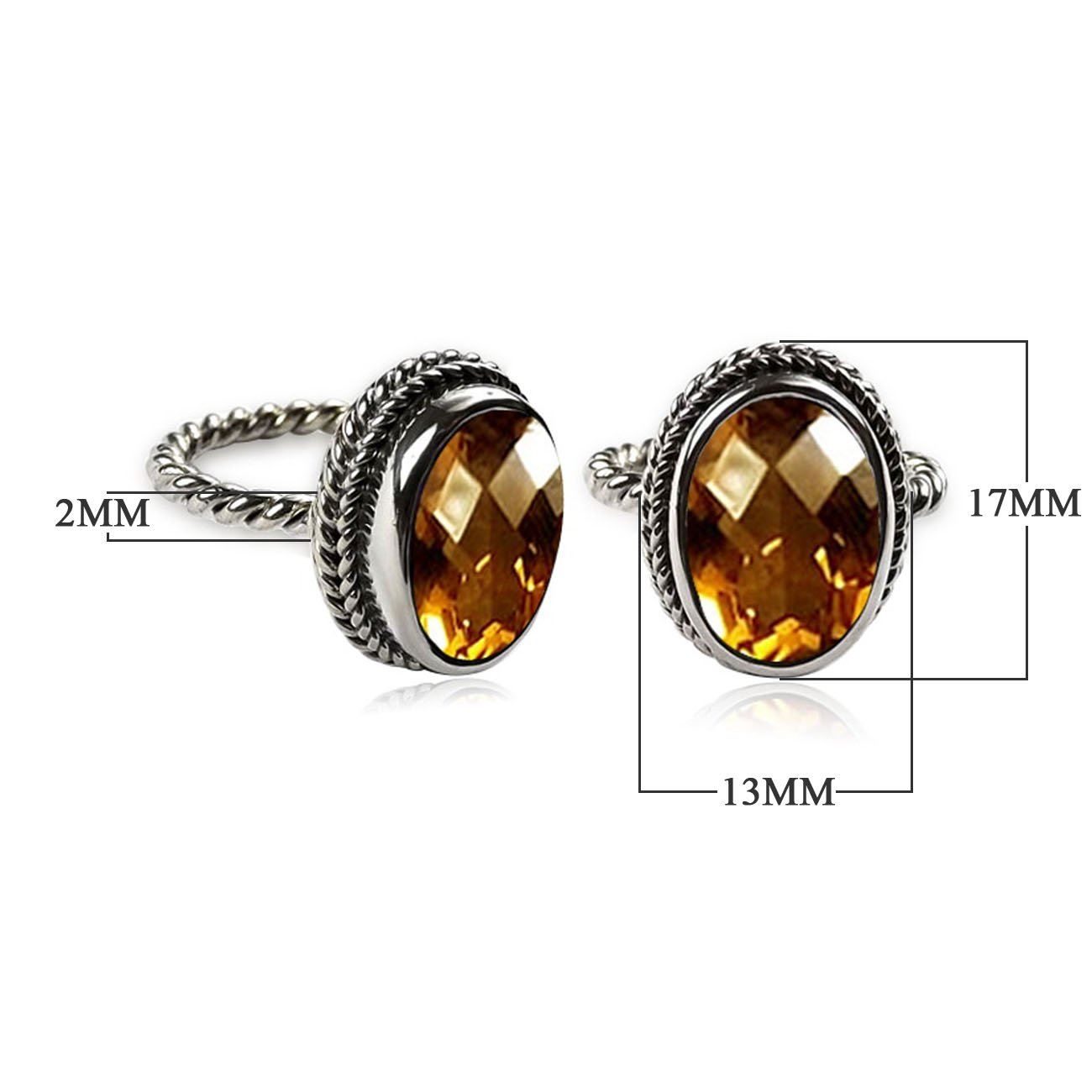 Handcrafted sterling silver Citrine Quartz ring with oval faceted Quartz and rope bezel, artisan jewelry from Indonesia.