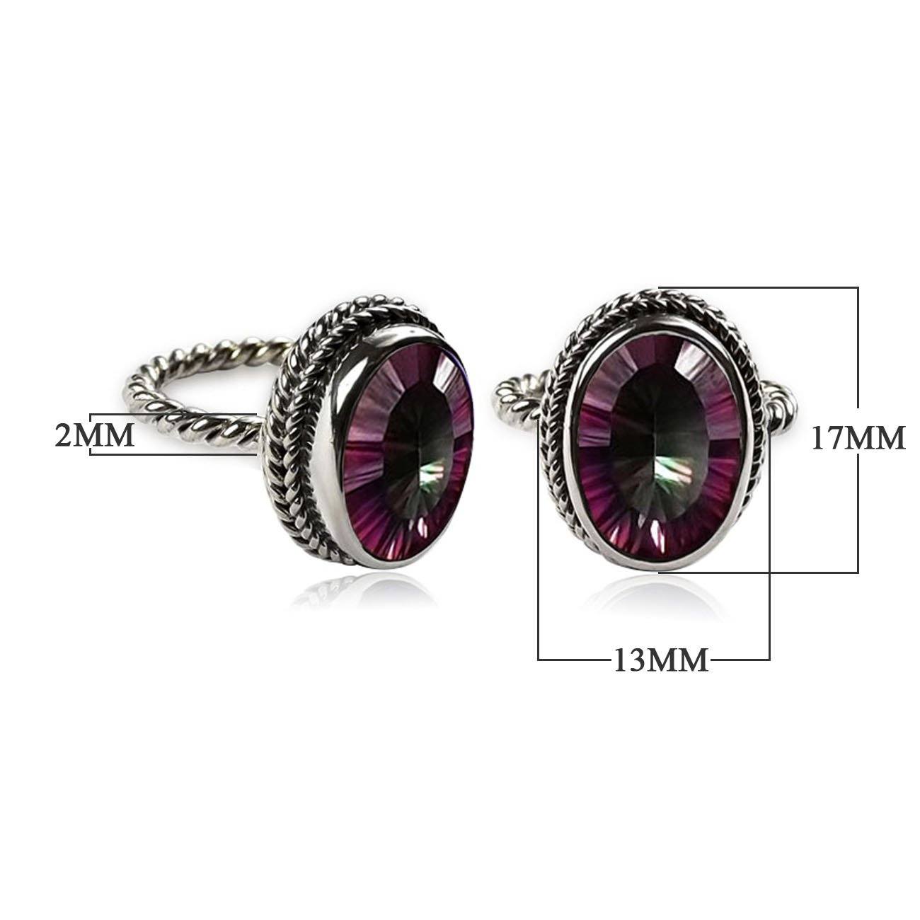Handcrafted sterling silver Mystic Quartz ring with oval faceted multicolor Quartz and rope bezel, artisan jewelry from Indonesia.