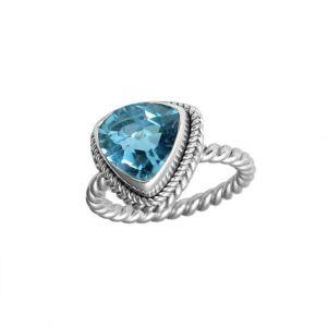 Handcrafted sterling silver Blue Topaz Quartz ring with faceted trillion-cut Quartz and rope bezel, artisan jewelry from Indonesia.