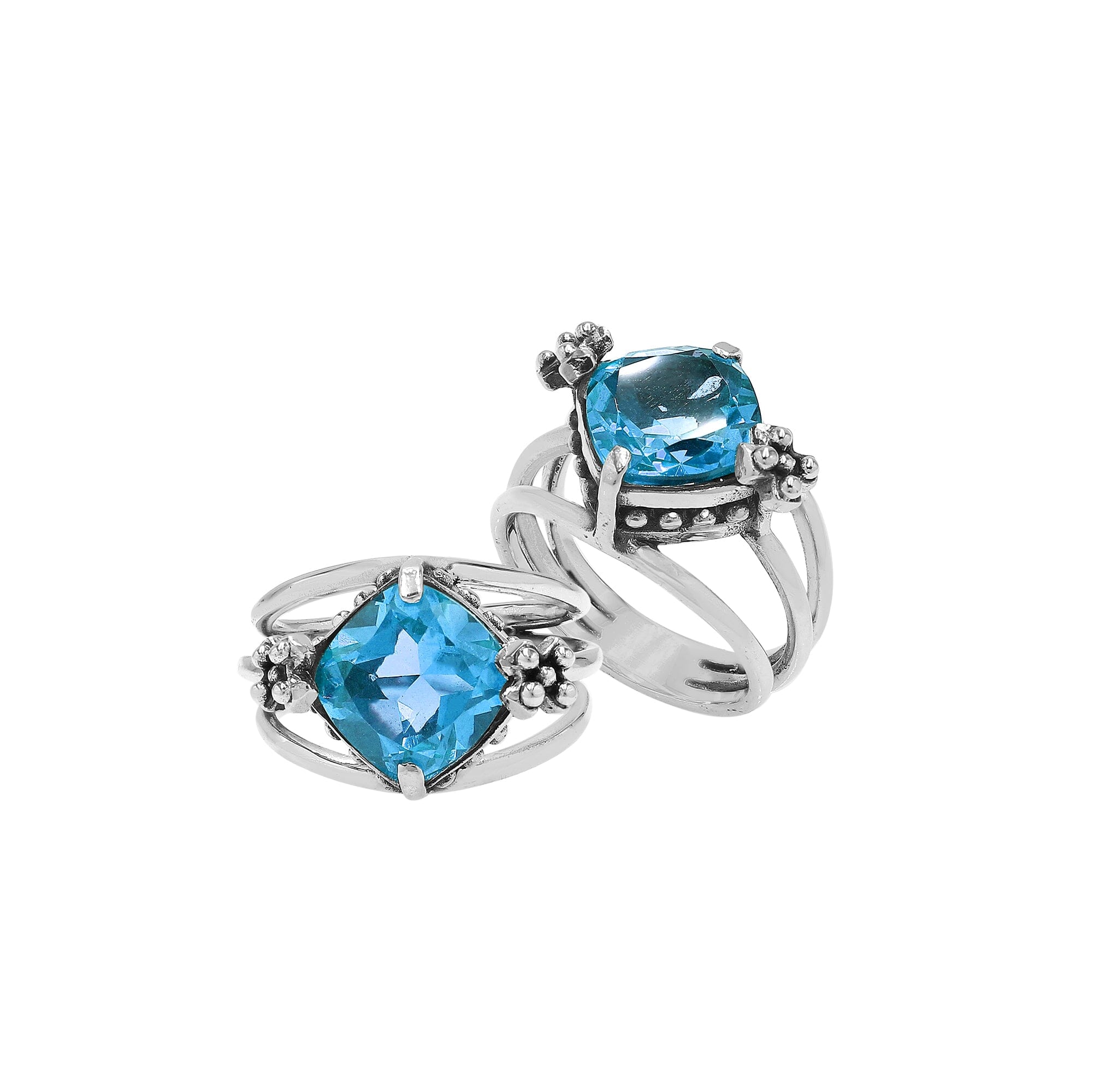 Handmade sterling silver Blue Quartz ring with floral details and split shank, artisan Bali jewelry.