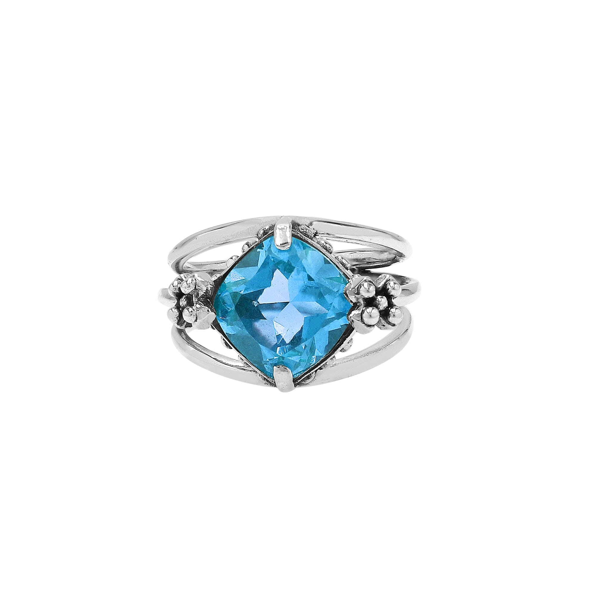 Handmade sterling silver Blue Quartz ring with floral details and split shank, artisan Bali jewelry.