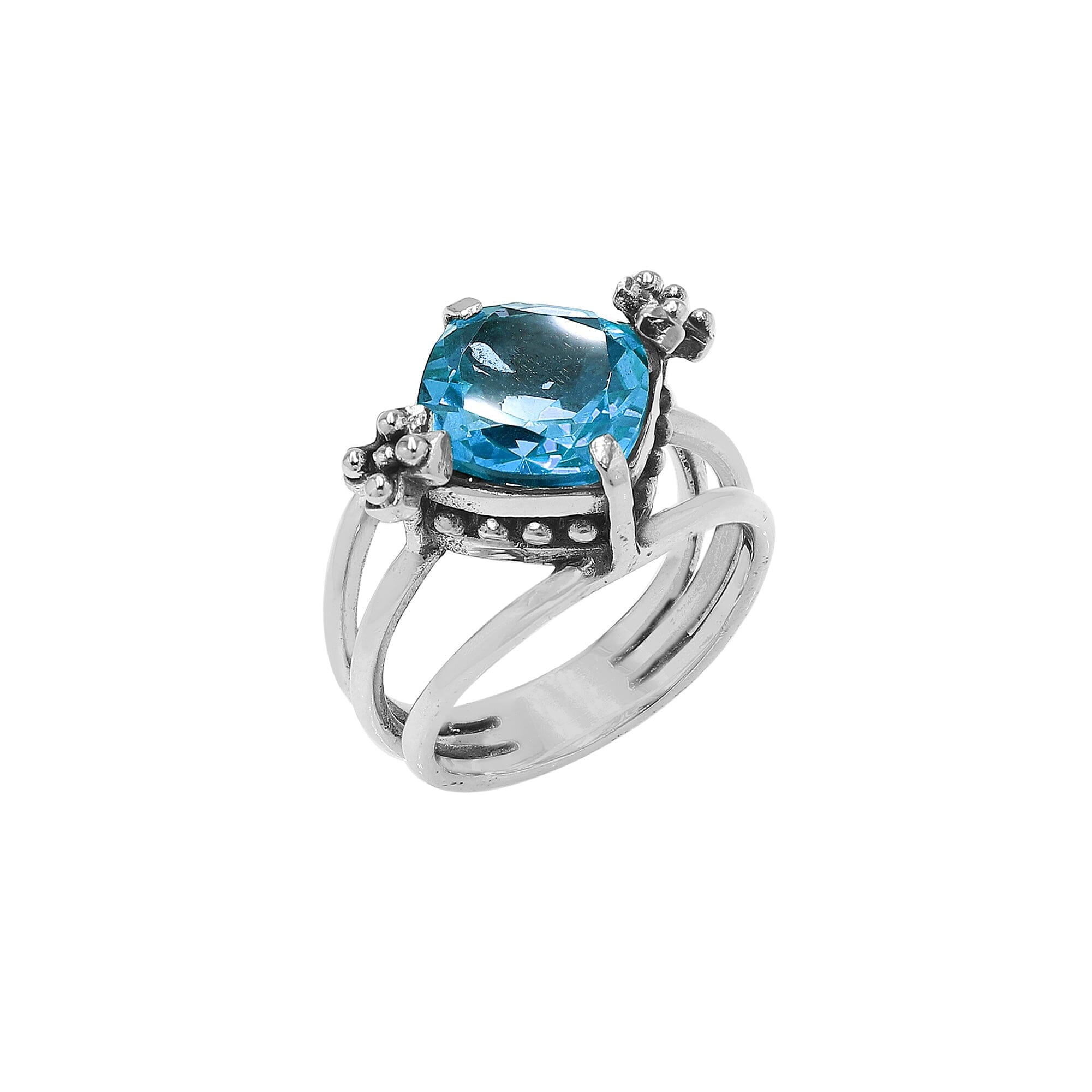 Handmade sterling silver Blue Quartz ring with floral details and split shank, artisan Bali jewelry.