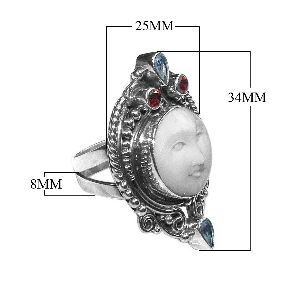 Handmade sterling silver Carved Shell Face Ring with Quartz accents, Balinese artisan jewelry.