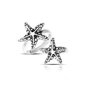 Handcrafted sterling silver Bali Starfish ring with textured oxidized details.