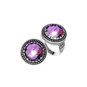 Handcrafted Bali sterling silver ring with faceted Amethyst Quartz and beaded halo design.