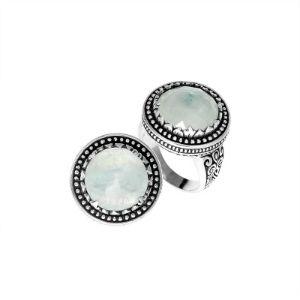 Handcrafted Bali sterling silver ring with Rainbow Moonstone and beaded halo design.