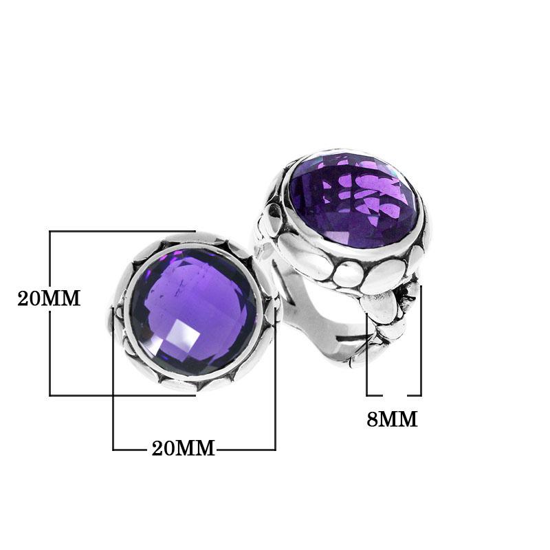 Handmade sterling silver Balinese ring with round-cut Amethyst Quartz in a bold bezel design.
