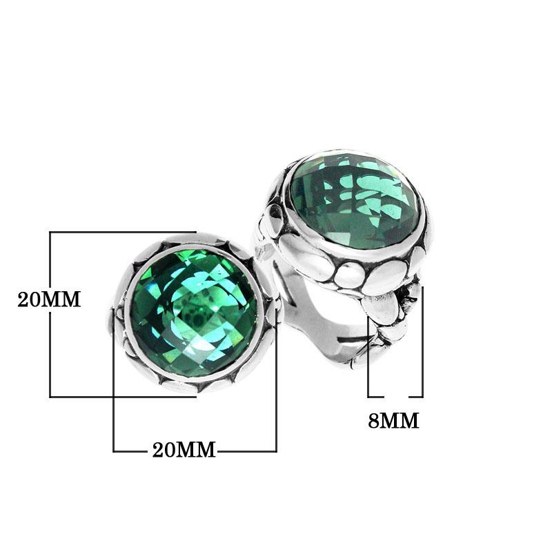 Handmade sterling silver Balinese ring with round faceted Green Quartz in a bold bezel.