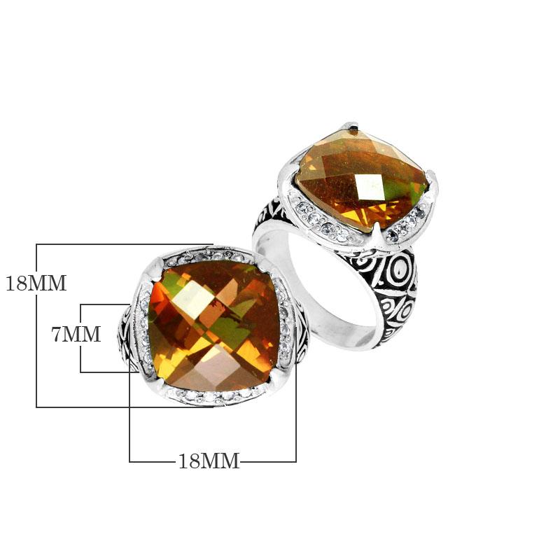 Handmade sterling silver Balinese ring with cushion-cut Citrine Quartz in warm golden tones.