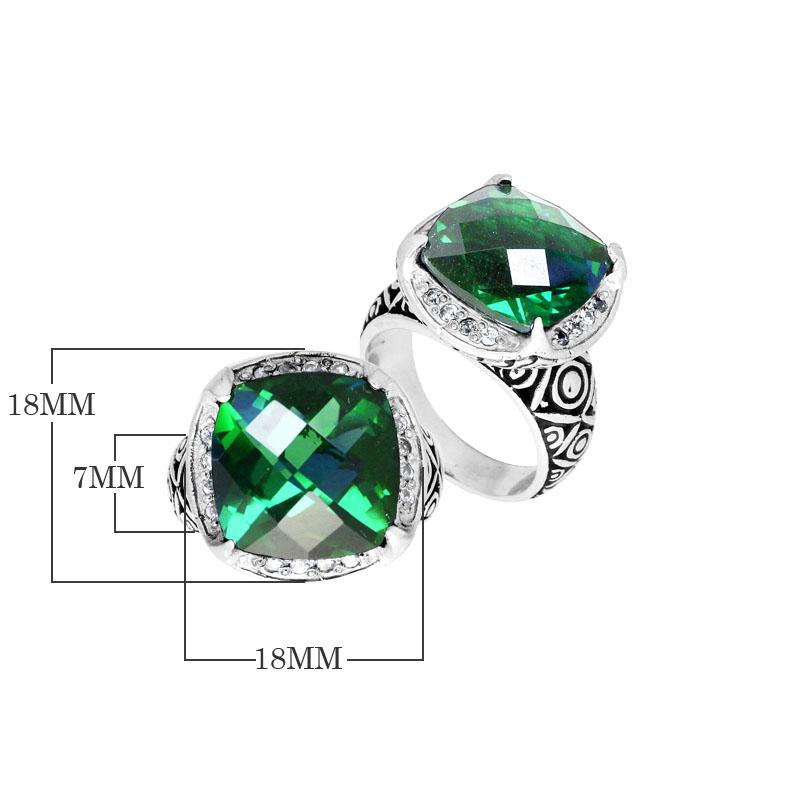 Handmade sterling silver Balinese ring with cushion-cut Green Quartz in vibrant tones.
