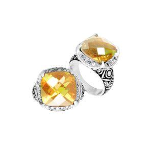 Handmade sterling silver Balinese ring with cushion-cut Lemon Quartz in a detailed setting.
