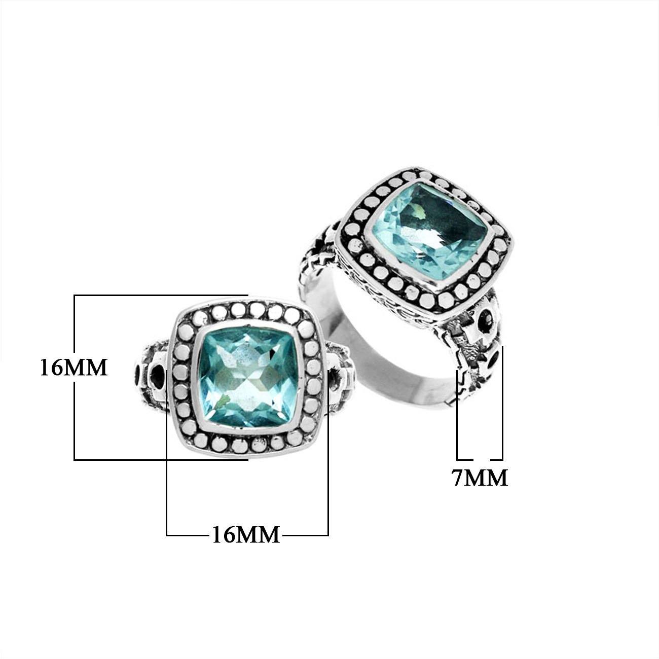 Handmade sterling silver Balinese ring with cushion-cut Blue Topaz Quartz in a dotted bezel.