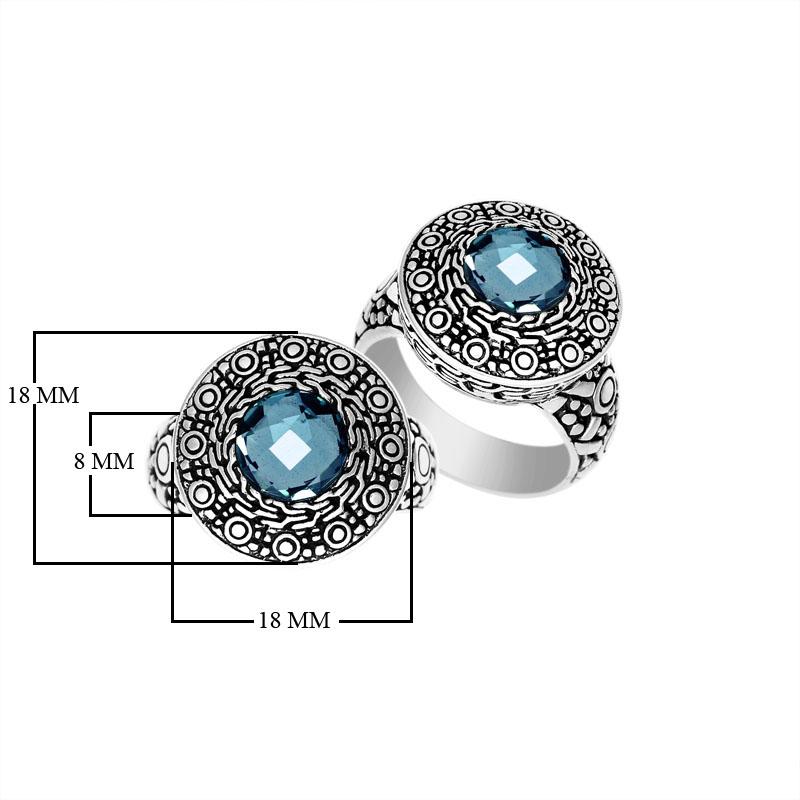 Handmade sterling silver Balinese ring with round-cut Blue Topaz Quartz and ornate engraved bezel.